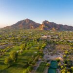 Camelback Mountain at sunrise in Phoenix, Arizona golf course and luxury homes