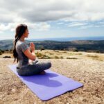 woman yoga practice in mountains