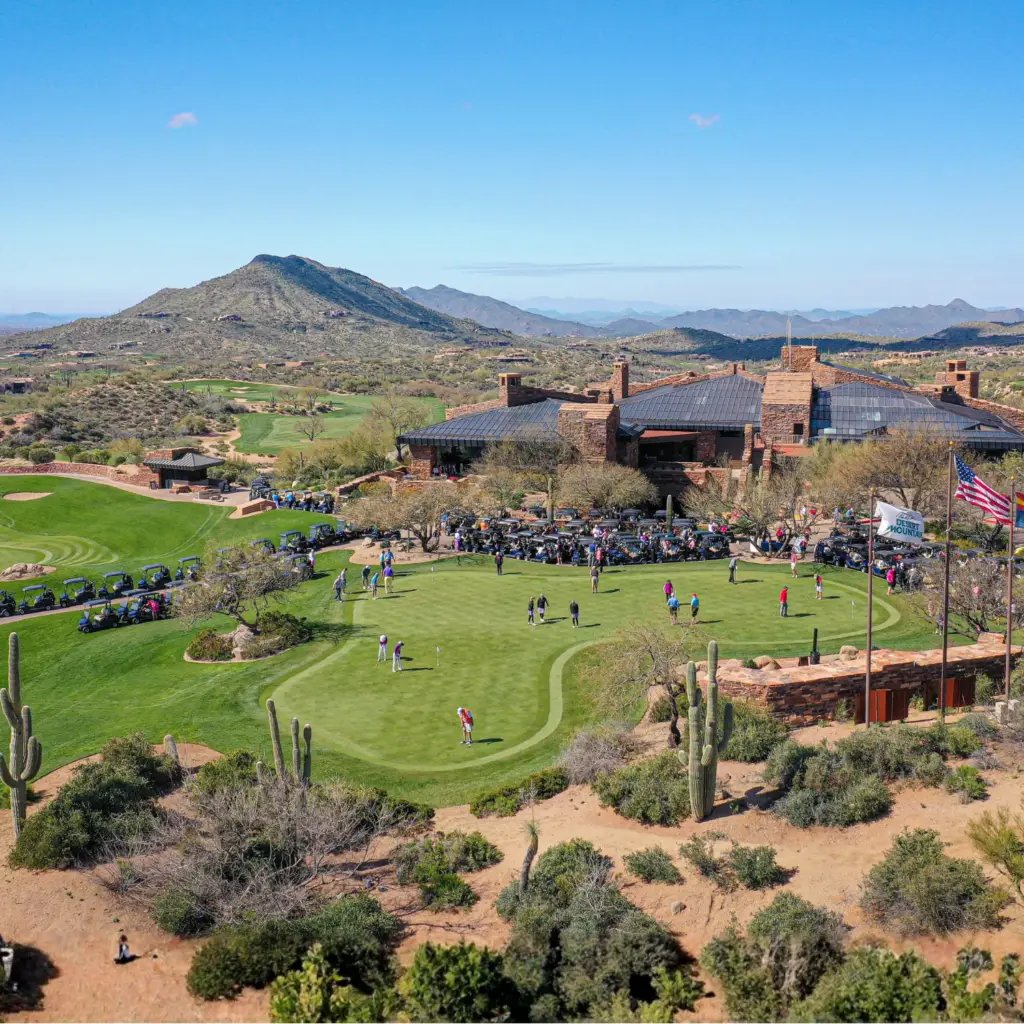 Golf fairways and desert landscaping around a clubhouse at Desert Mountain.